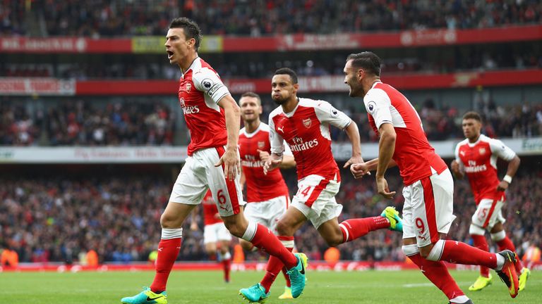 Laurent Koscielny celebrates scoring Arsenal's equaliser at the Emirates Stadium