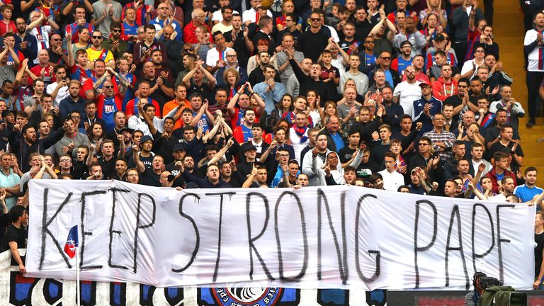 Crystal Palace fans display a banner for Pape Souare
