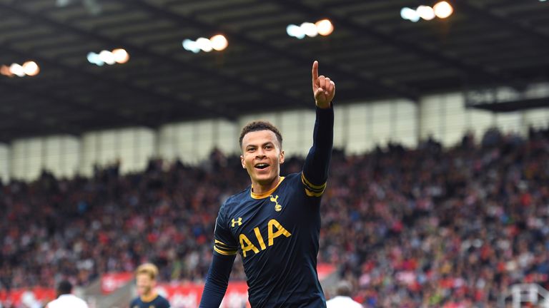 Dele Alli celebrates scoring his sides third goal