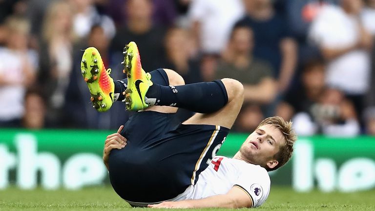 Eric Dier goes down holding his hamstring