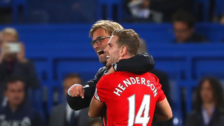Jurgen Klopp and Jordan Henderson of Liverpool celebrate victory over Cheslea at Stamford Bridge