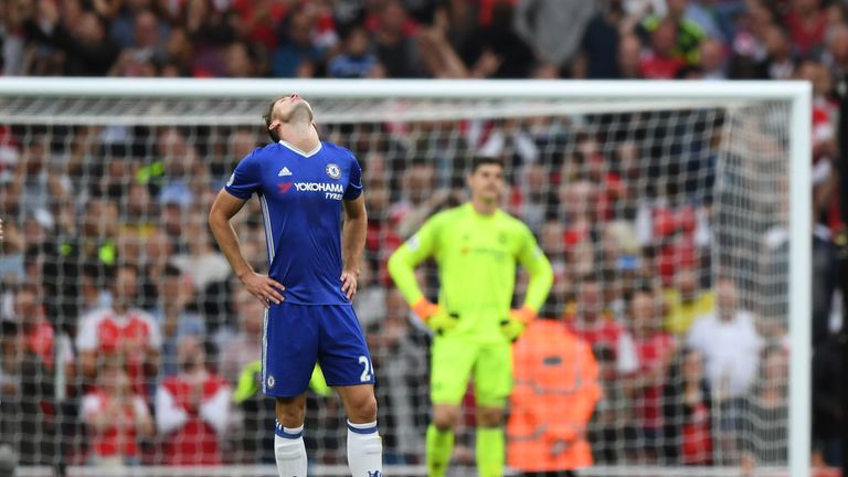 Gary Cahill looks to the sky after Arsenal score the Emirates Stadium