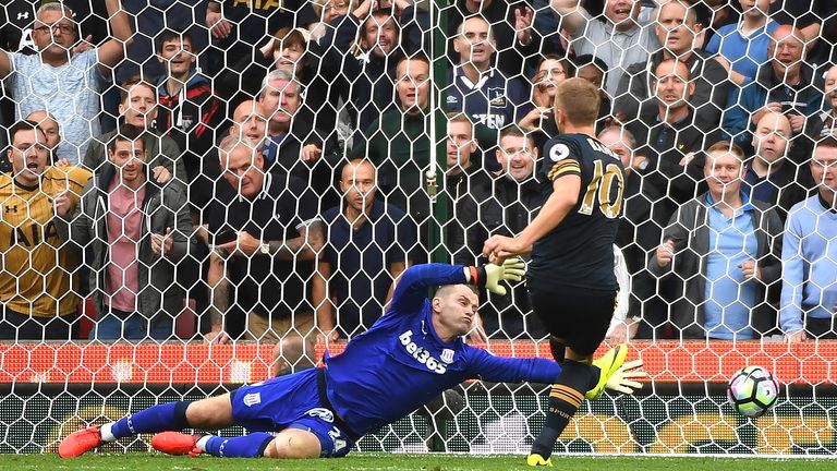 Harry Kane slots the ball past an outstretched Shay Given to score Tottenham's fourth goal