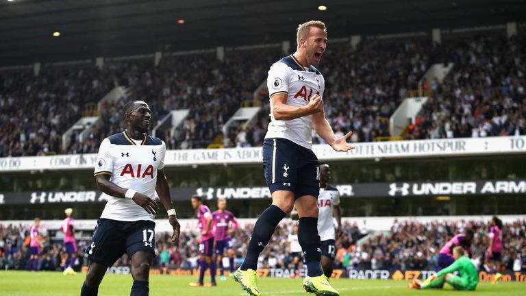 Harry Kane celebrates scoring his sides first goal with team-mate Moussa Sissoko