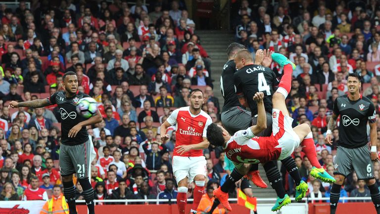 Laurent Koscielny equalises with an overhead kick at the Emirates Stadium