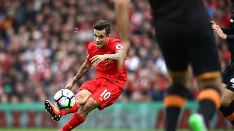 Philippe Coutinho scores Liverpool's fourth from a free kick