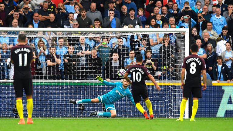 Sergio Aguero scores Manchester City's second from the penalty spot