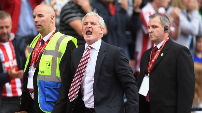  Mark Hughes reacts after being sent to the stands