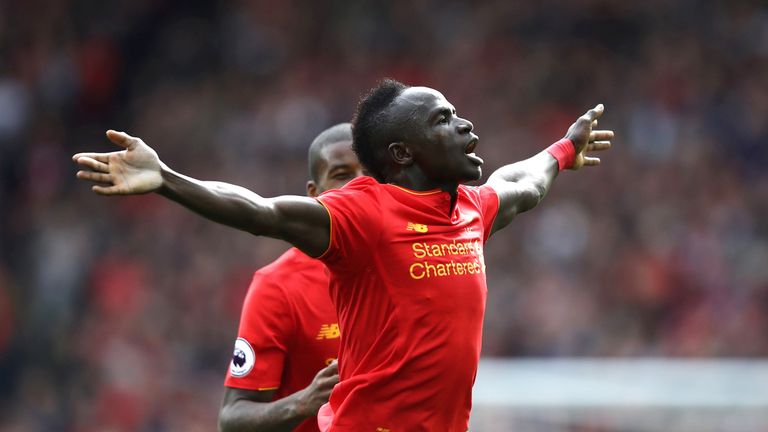 Sadio Mane celebrates scoring the third goal of the game for Liverpool