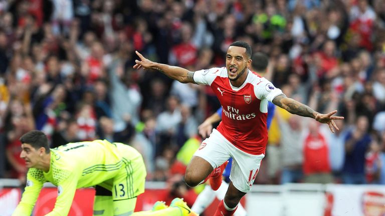 Theo Walcott celebrates scoring Arsenal's second goal