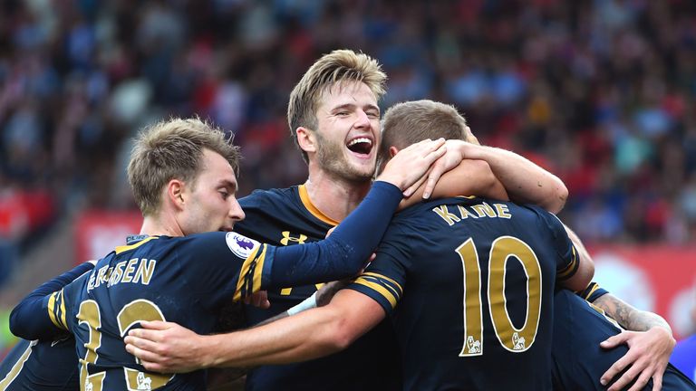Harry Kane (R) celebrates Tottenham's fourth goal with his team-mates