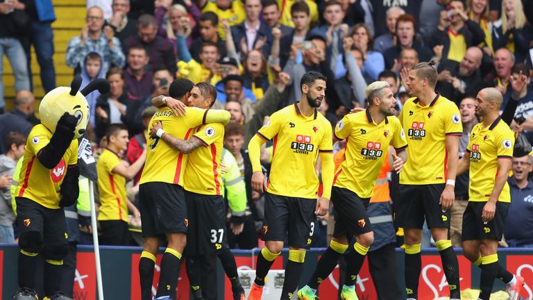 Troy Deeney celebrates scoring Watford's third goal with his team-mates