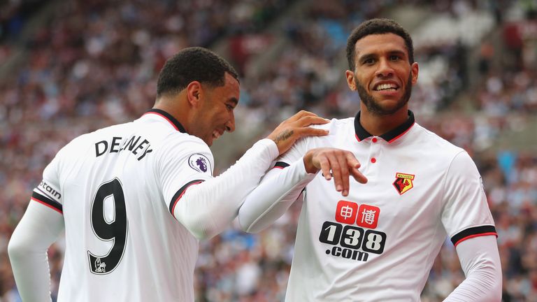 Etienne Capoue of Watford (R) celebrates scoring his sides third goal with Troy Deeney