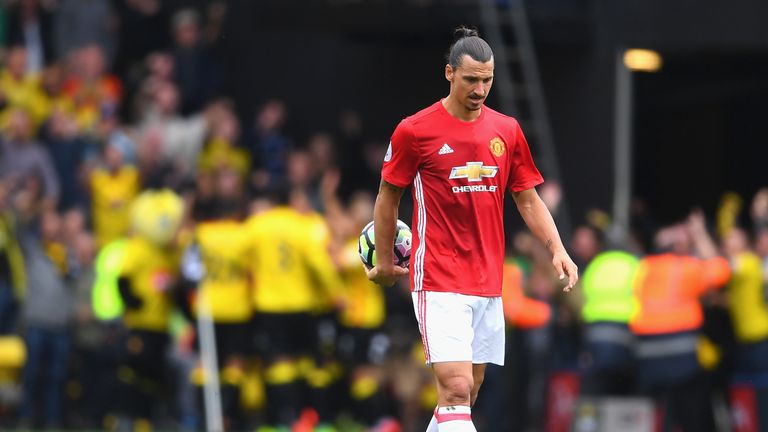 Zlatan Ibrahimovic appears dejected as he walks back to the centre circle
