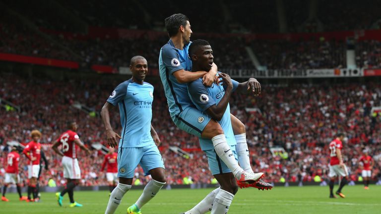 MANCHESTER, ENGLAND - SEPTEMBER 10:  Kelechi Iheanacho of Manchester City celebrates scoring his sides second goal with his team mate Nolito of Manchester 