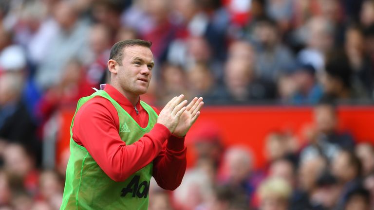 Wayne Rooney shows his apperciation to the fans during the game at Old Trafford