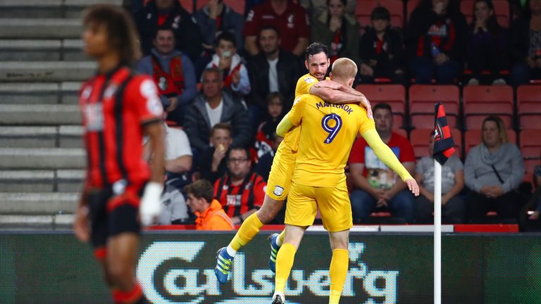 Greg Cunningham (L) of Preston North End celebrates with the opening goalscorer Simon Makienok 