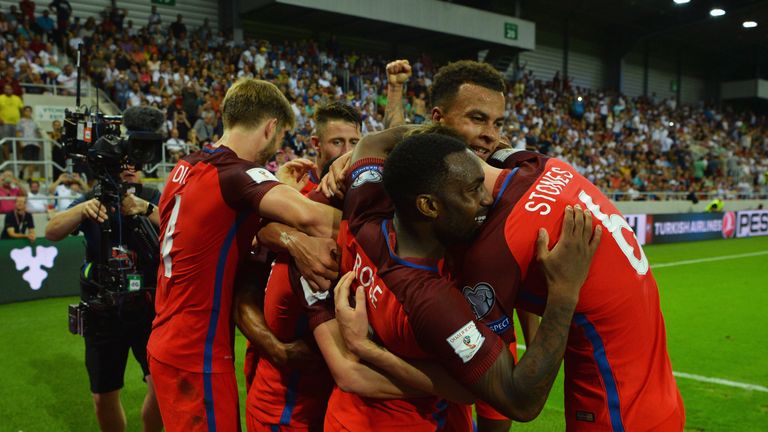 TRNAVA, SLOVAKIA - SEPTEMBER 04:  Adam Lallana of England (obscured) celebrates with team mates as he scores their first goal during the 2018 FIFA World Cu