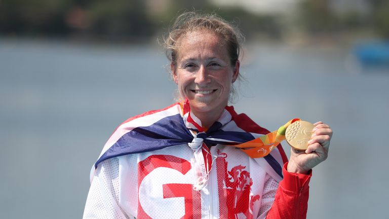 Great Britain's Rachel Morris celebrates on the podium with her gold medal in the AS Women's Single Sculls at the Lagoa Stadium during the fourth day of th