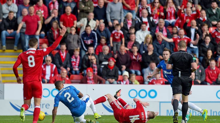 James Tavernier slid in on Jonny Hayes and won the ball but a free kick was given and the Rangers defender was booked