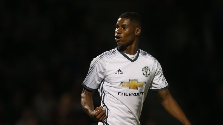 Marcus Rashford of Manchester United celebrates scoring his team's third goal during the EFL Cup Third Round match be