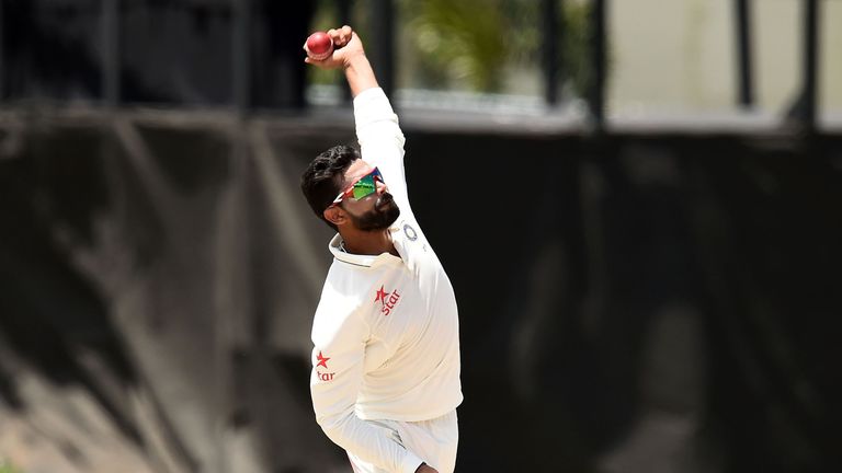 Indian cricketer Ravindra Jadeja delivers a ball during the three-day tour match between India and WICB President's XI squad at the Warner Park stadium