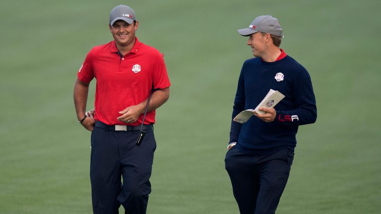 Patrick Reed and Jordan Spieth put the first red on the board
