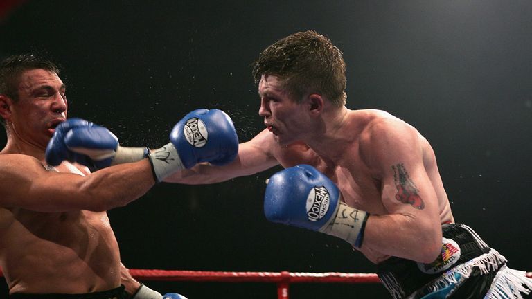 MANCHESTER, ENGLAND - JUNE 4:  Ricky Hatton (R) connects with a right cross on Kostya Tszyu during the IBF light welterweight title fight at the MEN Arena 