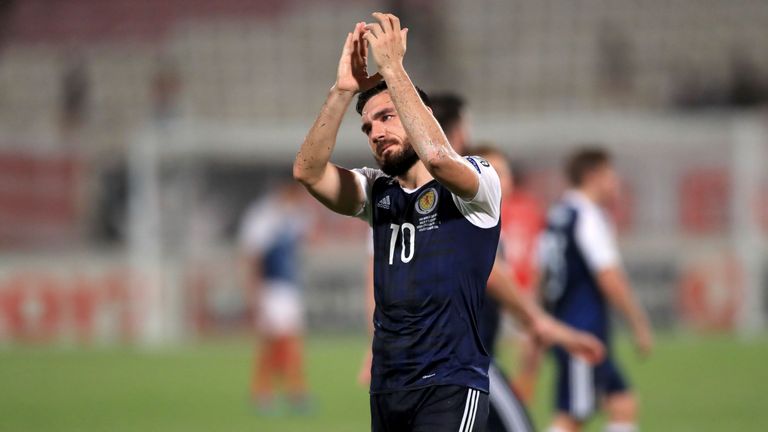Scotland's hat trick scorer Robert Snodgrass applauds the fans 