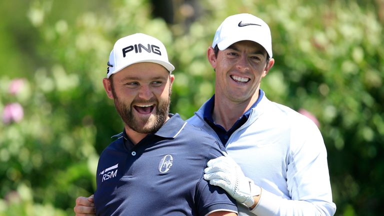AUSTIN, TX - MARCH 22: Rory McIlroy of Northern Ireland enjoying a fun moment with Andy Sullivan of England during practice for the 2016 World Golf Champio