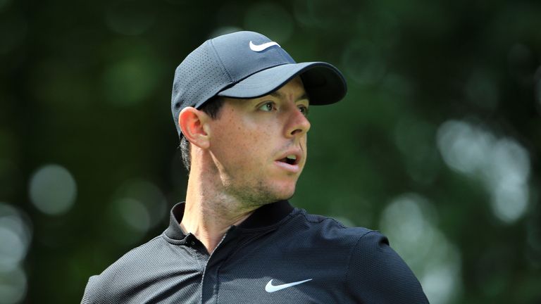 NORTON, MA - SEPTEMBER 03:  Rory McIlroy of Northern Ireland reacts to his shot from the ninth tee during the second round of the Deutsche Bank Championshi