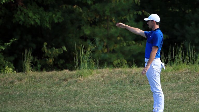 McIlroy did well to hole a 14-foot putt for a seven at the 12th