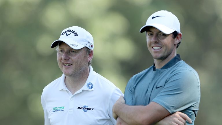 Putting coach Phil Kenyon (L) has started working with McIlroy in recent weeks