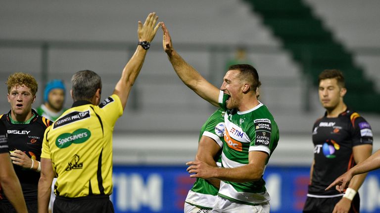 Alberto Sgarbi celebrates his side's first try against the Dragons