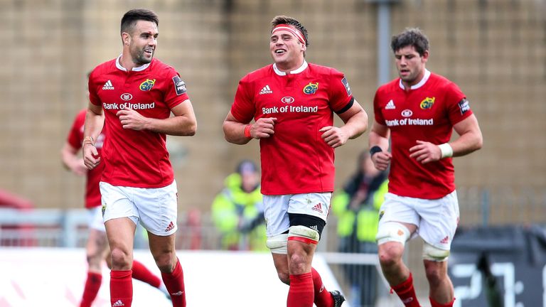 Conor Murray celebrates with CJ Stander after scoring his first try against Edinburgh