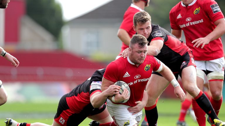 Dave Kilcoyne is tackled by Jack Cosgrove and Chris Dean of Edinburgh