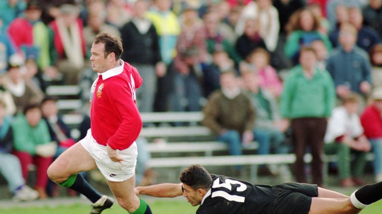 Ieuan Evans rounds Sam Doyle of New Zealand to score a try during the 1993 tour