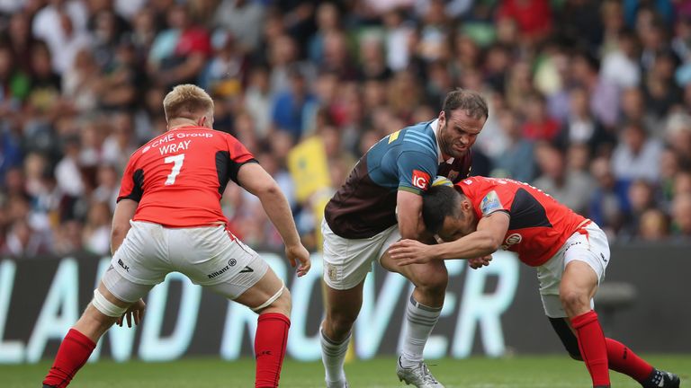 Harlequins centre Jamie Roberts takes on the  Saracens defence