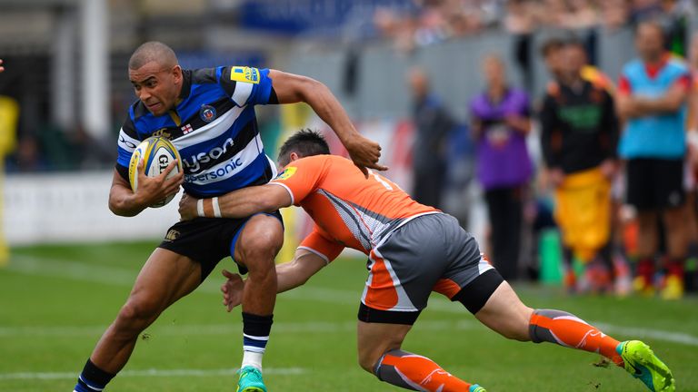 Jonathan Joseph breaks the tackle of Newcastle's Mike Delany