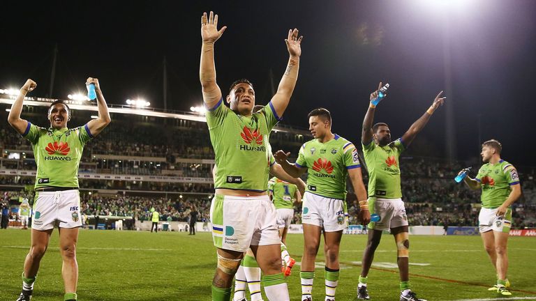 Canberra players celebrate their semi-final victory over Penrith