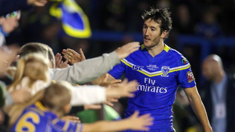 Stefan Ratchford celebrates with the fans after Warrington's win over St Helens