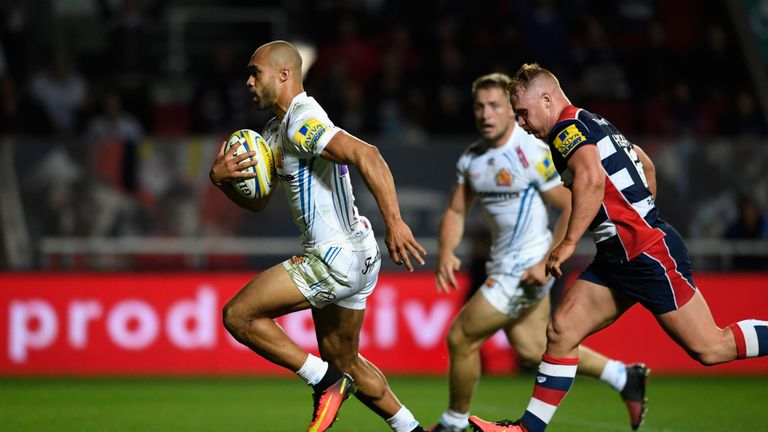 Olly Woodburn races to the line to score against Bristol