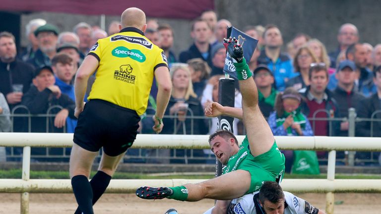 Tommy Seymour scores his second try against Connacht despite the efforts of Caolin Blade
