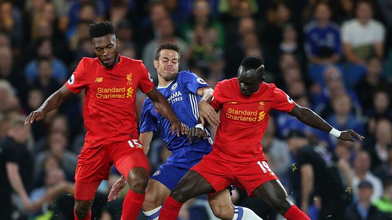 Chelsea's Cesar Azpilicueta (centre) battles for the ball against Liverpool's Daniel Sturridge (left) and Sadio Mane 