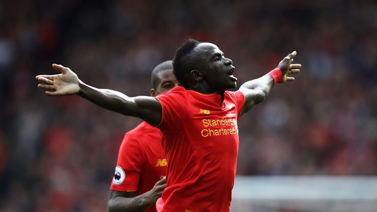 LIVERPOOL, ENGLAND - SEPTEMBER 24: Sadio Mane of Liverpool celebrates scoring his sides third goal during the Premier League match between Liverpool and Hu