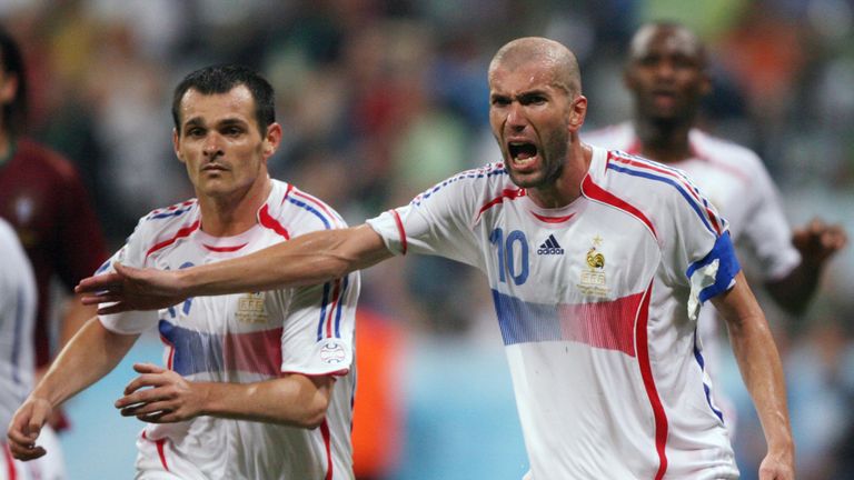 Munich, GERMANY:  French midfielder Zinedine Zidane (R) reacts as French defender Willy Sagnol (L) looks on during the semi-final World Cup football match 