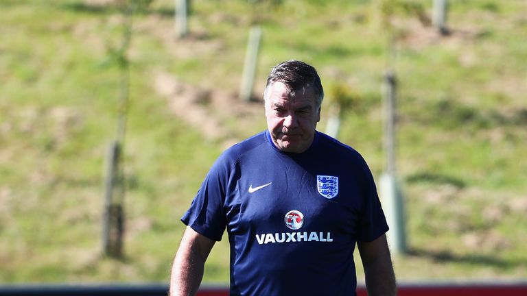 BURTON-UPON-TRENT, ENGLAND - AUGUST 30:  Sam Allardyce, manager of England kicks a ball during an England training session at St George's Park on August 30