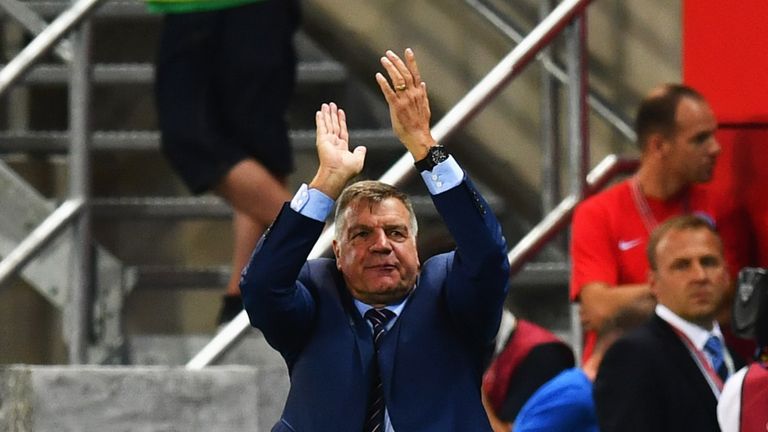 Sam Allardyce manager of England applauds the travelling fans 