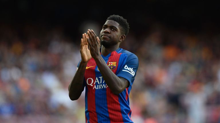 Barcelona's French defender Samuel Umtiti applauds supporters during the annual 51st Joan Gamper Trophy friendly football match beteen Barcelona FC and UC 