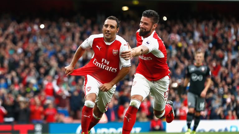 Arsenal's Santi Cazorla celebrates scoring a goal with Olivier Giroud during their Premier League match against Southampton